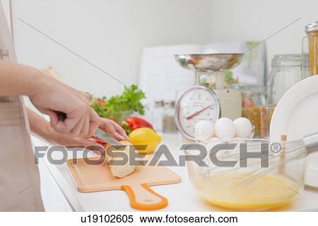 Woman preparing meal View Large Photo Image Stock Photography - Woman preparing meal. Fotosearch