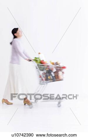Woman shopping for groceries View Large Photo Image Stock Image - Woman shopping for groceries. Fotosearch