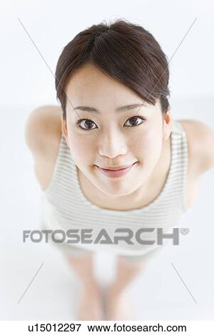 Woman smiling View Large Photo Image Stock Photo - Woman smiling. Fotosearch