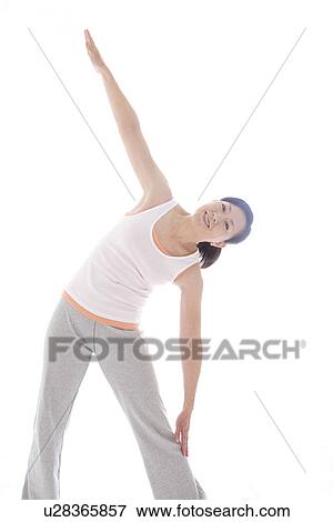 Woman stretching View Large Photo Image Stock Photo - Woman stretching. Fotosearch