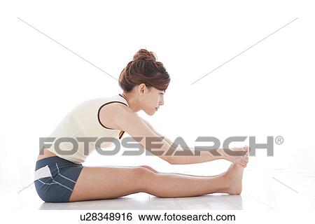Woman stretching View Large Photo Image Stock Photograph - Woman stretching. Fotosearch