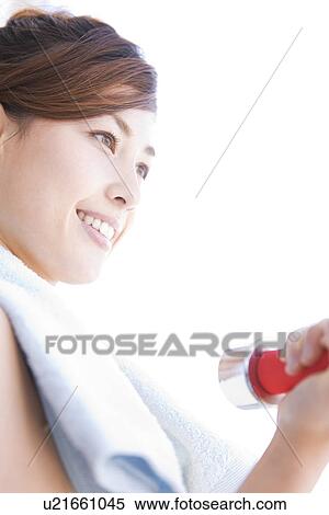 Woman working out at dumbbells View Large Photo Image Stock Photography - Woman working out at dumbbells. Fotosearch