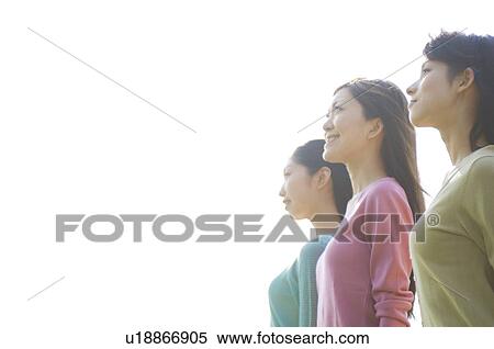 Women standing side by side View Large Photo Image Stock Photography - Women standing side by side. Fotosearch