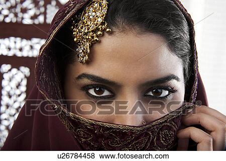 Stock Photo - Close-up of a Muslim womans eyes. Fotosearch