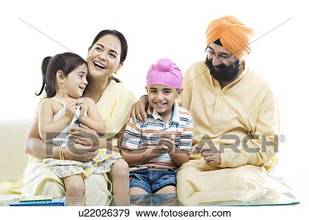 Grandparents spending time with their grand kids View Large Photo Image Stock Photo - Grandparents spending time with their grand kids. Fotosearch