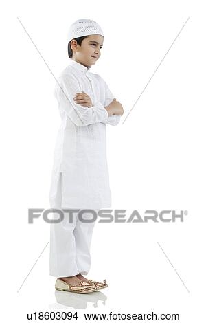 Picture - Muslim boy standing. Fotosearch