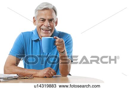 Old man having a cup of tea View Large Photo Image Stock Image - Old man having a cup of tea. Fotosearch