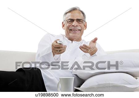 Old man watching television View Large Photo Image Stock Image - Old man watching television. Fotosearch
