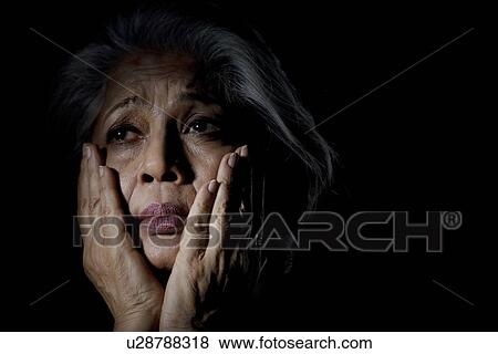 Stock Photo - Old woman feeling depressed. Fotosearch
