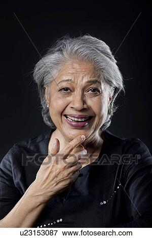 Stock Photo - Old woman laughing. Fotosearch