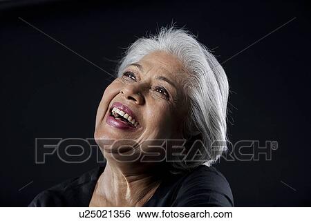 Stock Photograph - Old woman laughing. Fotosearch