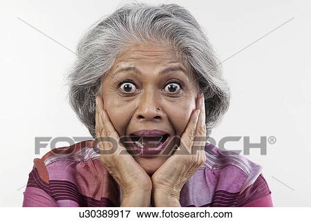 Stock Photo - Old woman surprised. Fotosearch