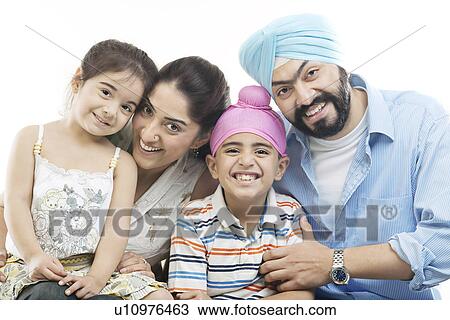 Stock Image - Portrait of a Sikh family. Fotosearch