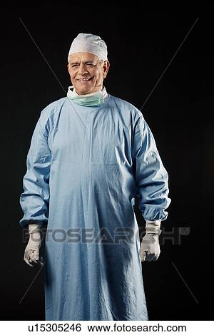 Stock Photograph - Portrait of a surgeon smiling. Fotosearch
