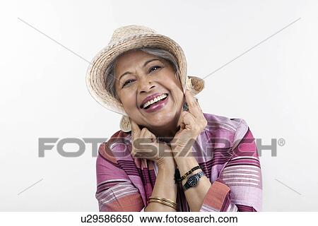 Portrait of an old woman smiling View Large Photo Image Stock Image - Portrait of an old woman smiling. Fotosearch