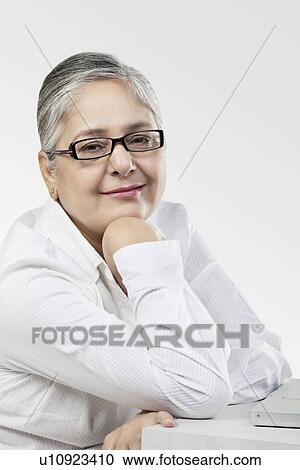 Stock Image - Portrait of an old woman. Fotosearch