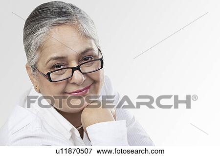 Portrait of an old woman View Large Photo Image Stock Photo - Portrait of an old woman. Fotosearch