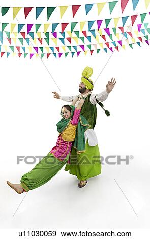 Sikh couple enjoying themselves View Large Photo Image Stock Photo - Sikh couple enjoying themselves. Fotosearch