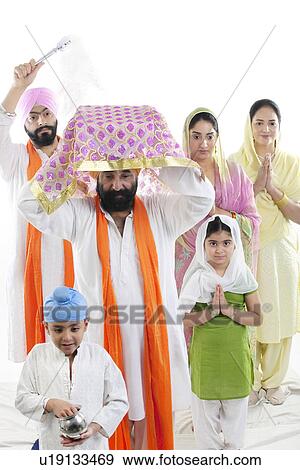 Sikh family performing Prabhat Pheri View Large Photo Image Stock Photo - Sikh family performing Prabhat Pheri. Fotosearch