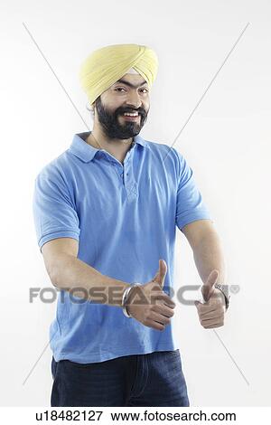 Sikh man giving thumbs-up View Large Photo Image Stock Photo - Sikh man giving thumbs-up. Fotosearch