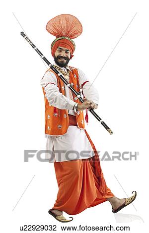 Sikh man holding a Khundi View Large Photo Image Stock Image - Sikh man holding a Khundi. Fotosearch