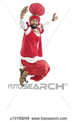 Sikh man jumping in the air View Large Photo Image Stock Photo - Sikh man jumping in the air. Fotosearch