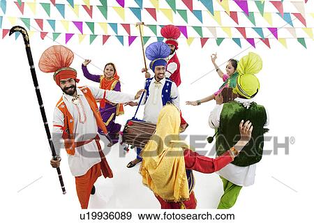 Stock Photo - Sikh men and women dancing. Fotosearch