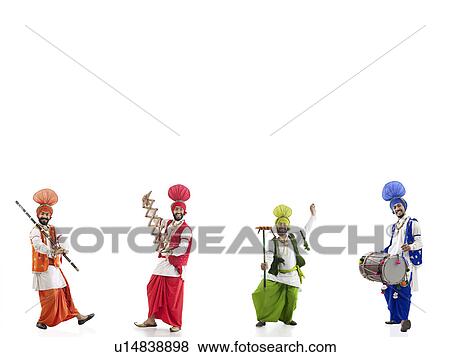 Stock Photo - Sikh men dancing. Fotosearch