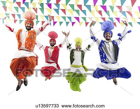 Sikh men jumping in the air View Large Photo Image Stock Image - Sikh men jumping in the air. Fotosearch