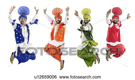 Stock Photograph - Sikh men jumping in the air. Fotosearch