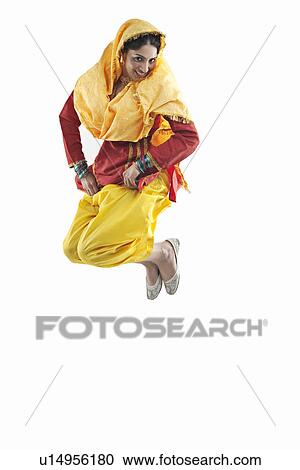 Sikh woman jumping in the air View Large Photo Image Stock Image - Sikh woman jumping in the air. Fotosearch