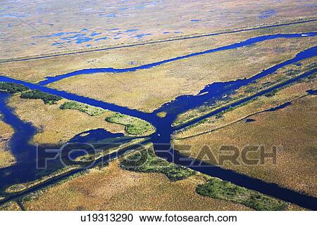 Stock Image - Aerial view of marsh. Fotosearch