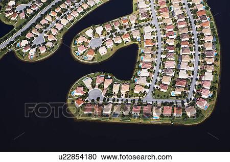 Stock Image - Aerial view of waterfront houses. Fotosearch