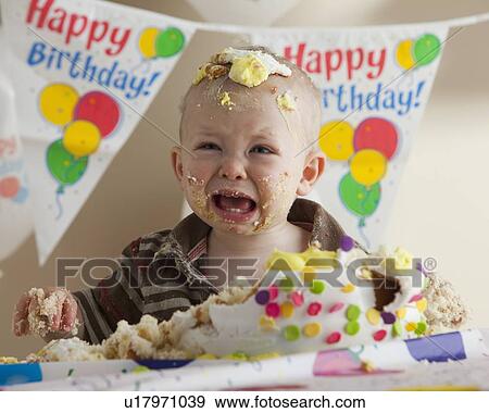 Baby covered in birthday cake View Large Photo Image Stock Photo - Baby covered in birthday cake. Fotosearch