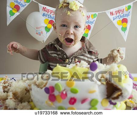 Baby covered in birthday cake View Large Photo Image Stock Photo - Baby covered in birthday cake. Fotosearch
