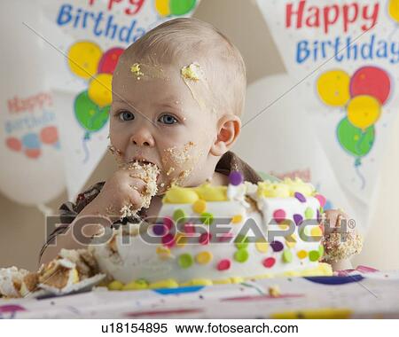 Baby eating birthday cake View Large Photo Image Stock Photography - Baby eating birthday cake. Fotosearch