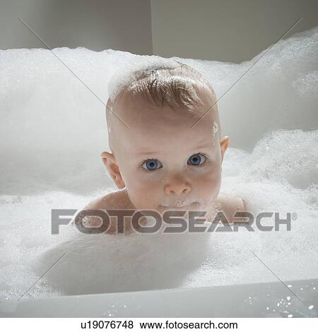 Baby in bathtub View Large Photo Image Stock Photo - Baby in bathtub. Fotosearch