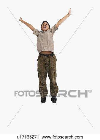 Boy jumping View Large Photo Image Stock Image - Boy jumping. Fotosearch