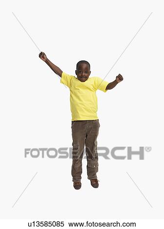 Stock Photography - Boy jumping. Fotosearch