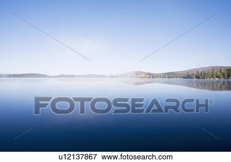 Calm lake View Large Photo Image Stock Photo - Calm lake. Fotosearch