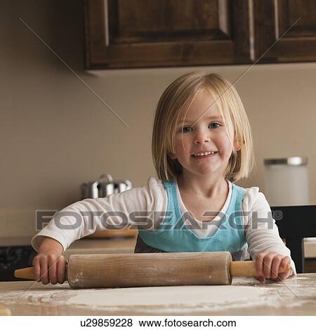 Child baking View Large Photo Image Stock Photo - Child baking. Fotosearch