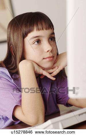 Child looking at computer View Large Photo Image Stock Photograph - Child looking at computer. Fotosearch