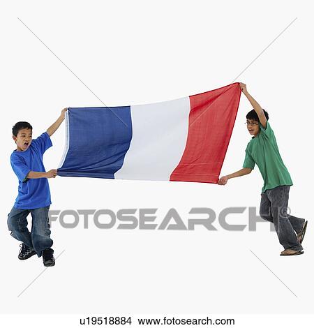 Picture - Children carrying flag. Fotosearch