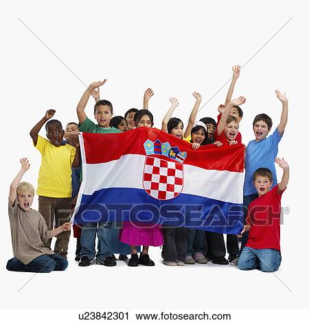Stock Image - Children holding flag. Fotosearch