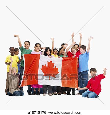 Stock Photograph - Children holding flag. Fotosearch
