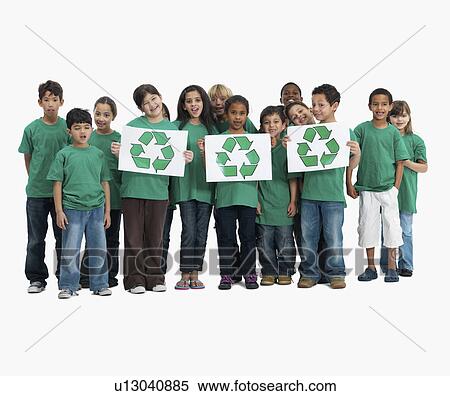 Stock Photography - Children holding recycle signs. Fotosearch