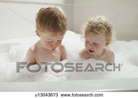 Children playing with bubbles in the bath tub View Large Photo Image Stock Image - Children playing with bubbles in the bath tub. Fotosearch