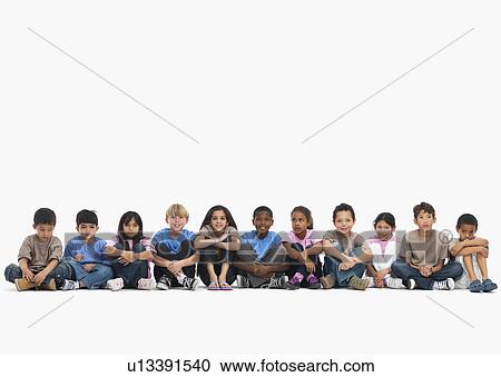 Children sitting in a row View Large Photo Image Stock Image - Children sitting in a row. Fotosearch