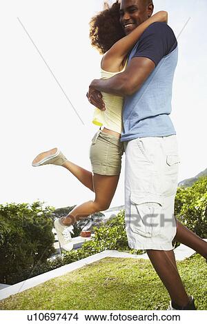Picture - Couple embracing. Fotosearch