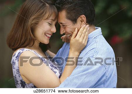 Couple embracing View Large Photo Image Picture - Couple embracing. Fotosearch